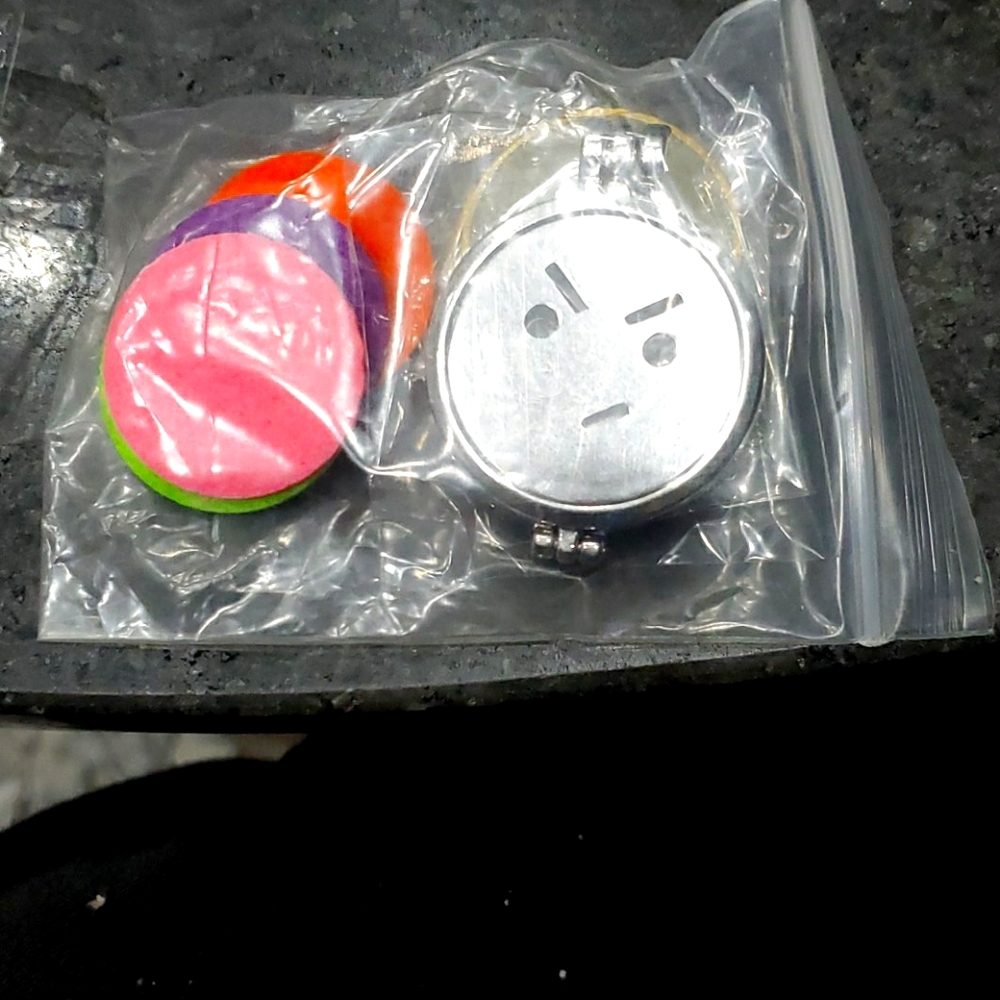 Angry hmm smiley face necklace